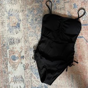 Never worn aerie swimsuit with cutouts- size large long